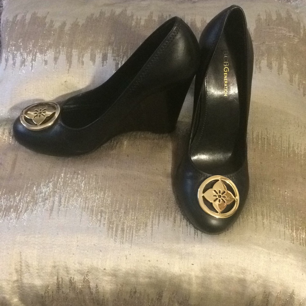 BCBGeneration Black Wedges Gold Medallion